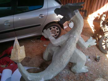 The raw paper shell of the head and body assembled in the workshop.
