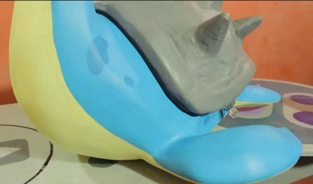 The removable shell lid lifted away from the body to expose the storage cavity.