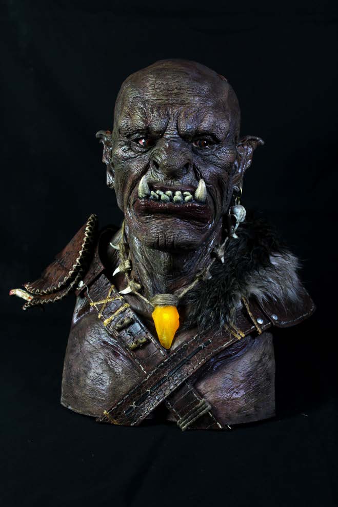 Three-quarter view of the finished orc bust showing costume detailing at the shoulders.