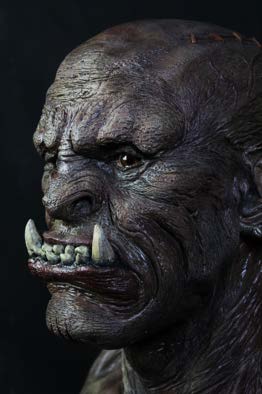 Angled portrait of the orc bust showing the brow, eye socket and mouth detail.