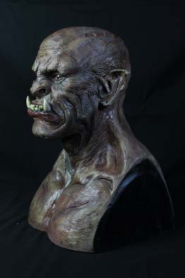 Side view of the finished orc bust highlighting the ear, jaw and neck anatomy.