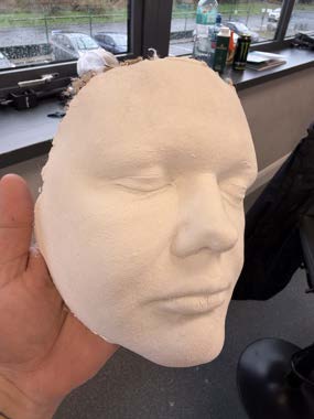 The finished lifecast positive core of the face used as a sculpting base.