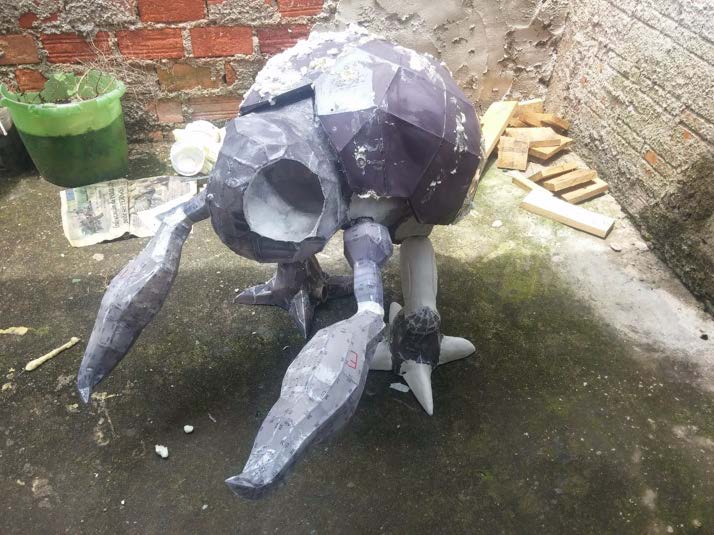 The raw Pepakura paper shell assembled before resin and fibreglass reinforcement.